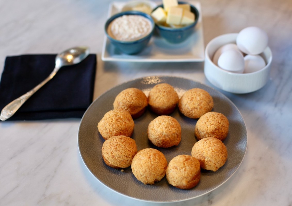 gougères - small yellowish balls on a plate