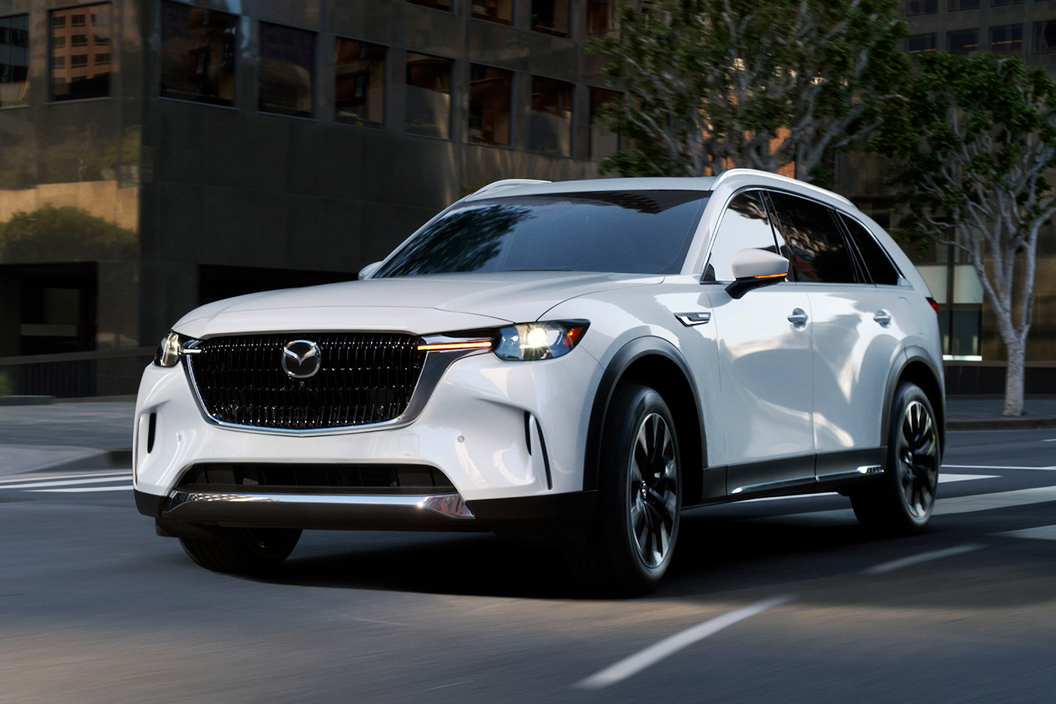 The 2024 Mazda CX-90, a new three-row SUV, in white