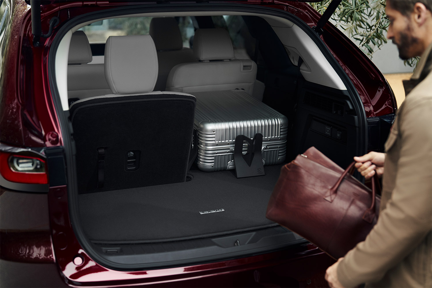 Cargo space with bags in the new 2024 Mazda CX-90 SUV