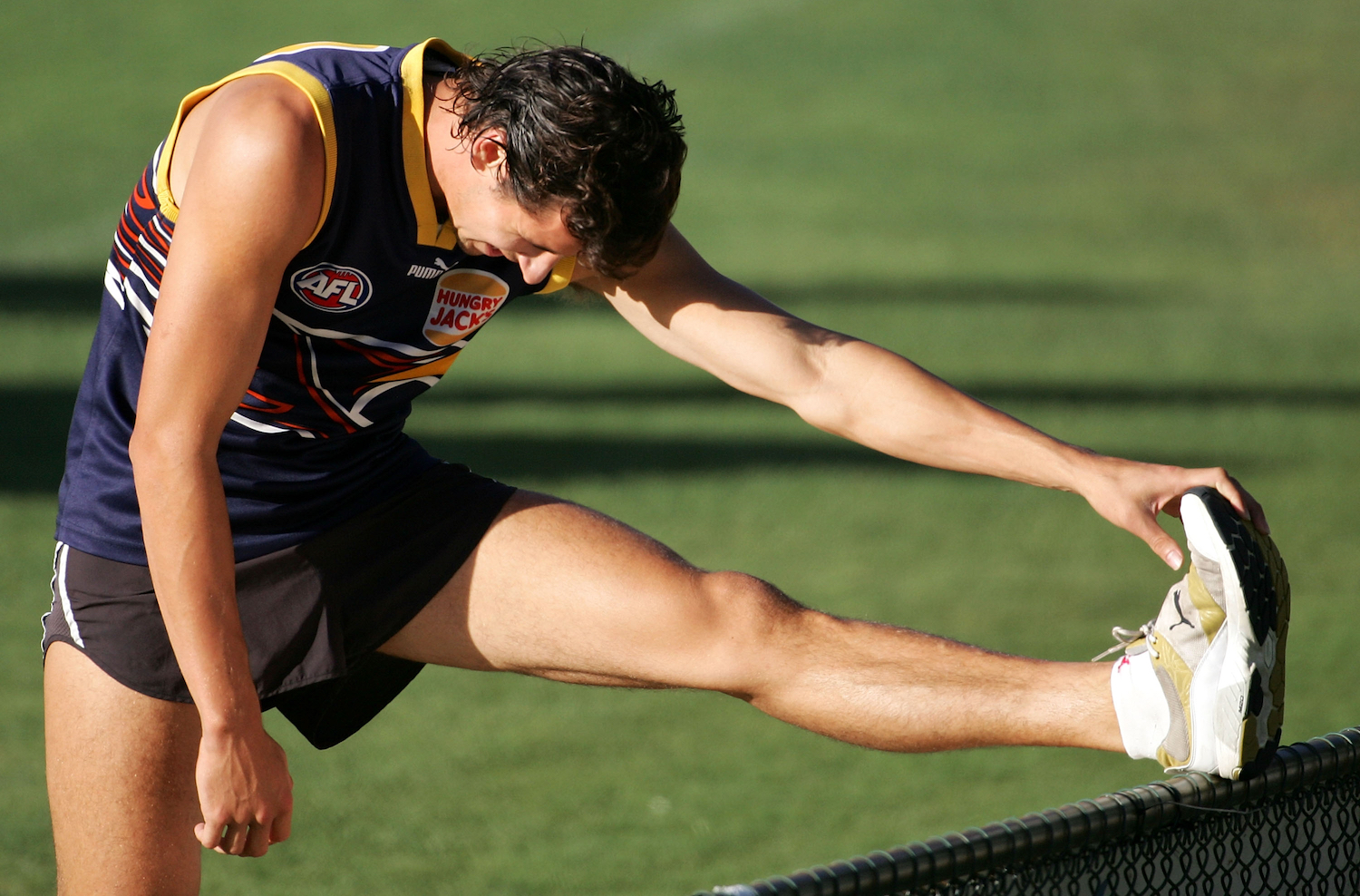 PERTH, AUSTRALIA - MARCH 21:  Andrew Embley of the Eagles stretches out during the West Coast Eagles AFL training session at Subiaco Oval March 21, 2007 in Perth, Australia.  (Photo by Paul Kane/Getty Images)