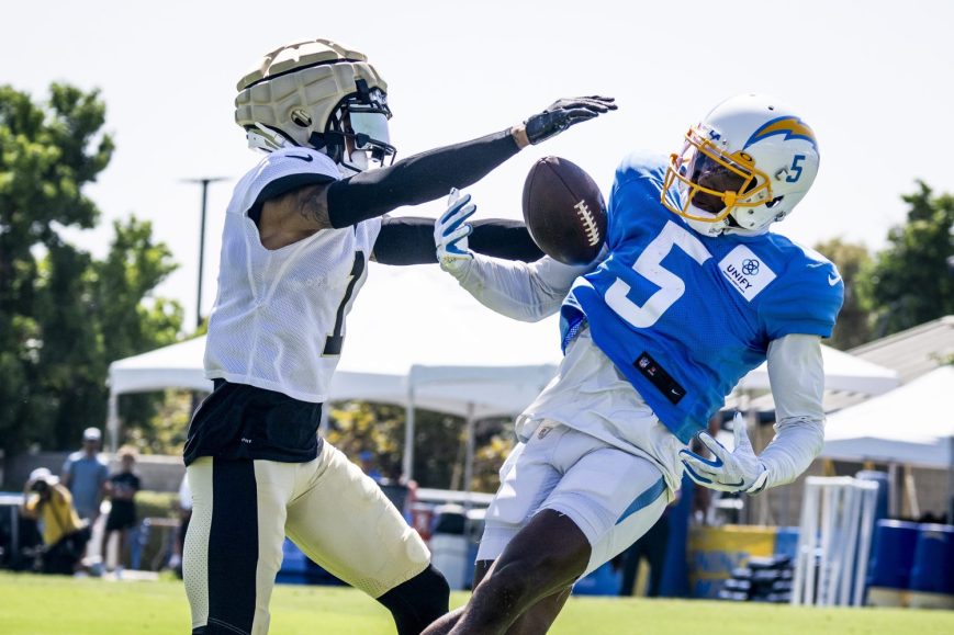 Charger Joshua Palmer tries to bring in a pass at a joint practice.