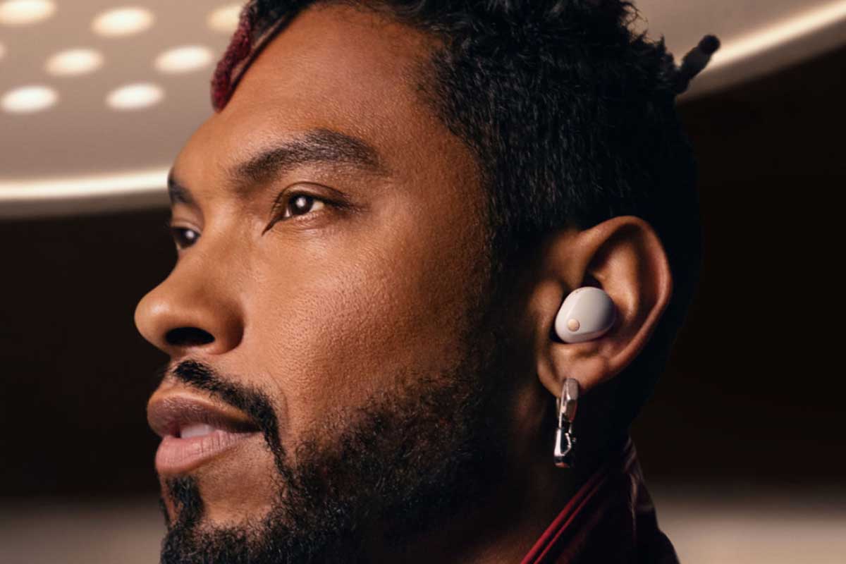 The silver WF-1000XM5 earbuds, as seen on recording artist Miguel