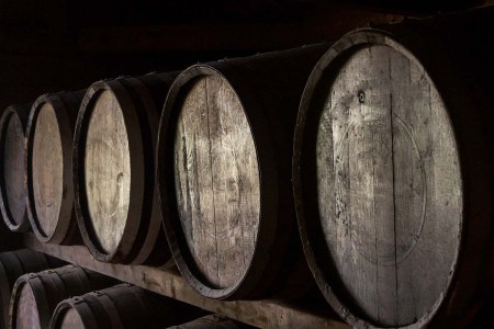 Wooden barrels in a warehouse of a whiskey distillery in Hokkaido, Japan. Barrels of whisky are being used as collateral for loans in Japan.