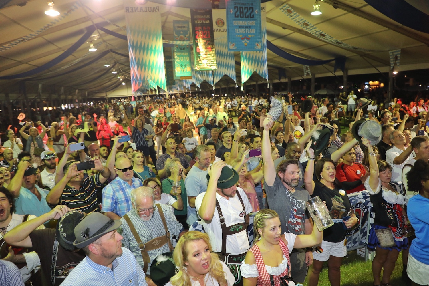 Crowd of people dressed up for Oktoberfest
