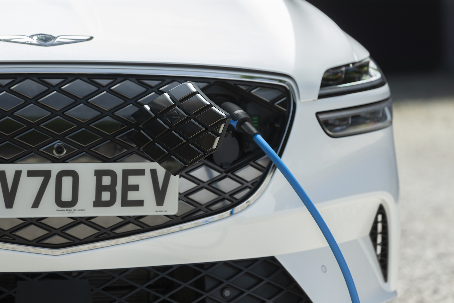 The charging portal on the front of the GV70 Electrified from Genesis