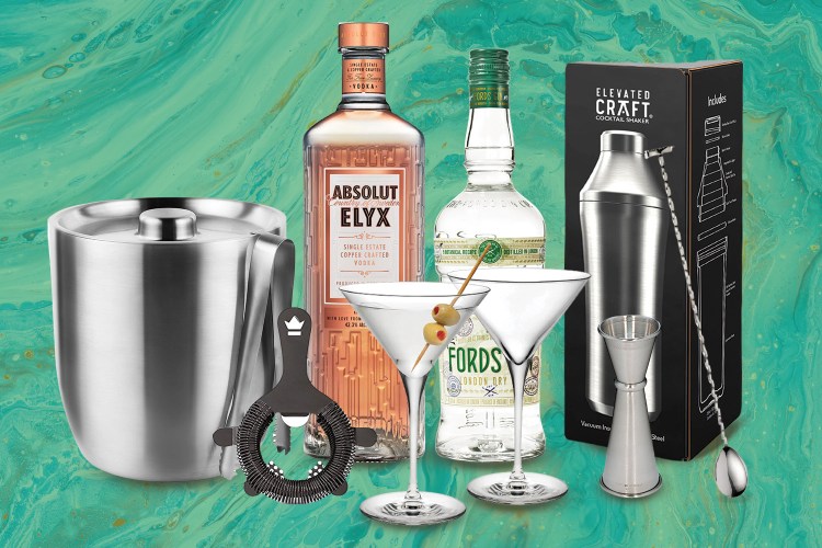 Various bar tools and booze bottles, ideal for a bar cart