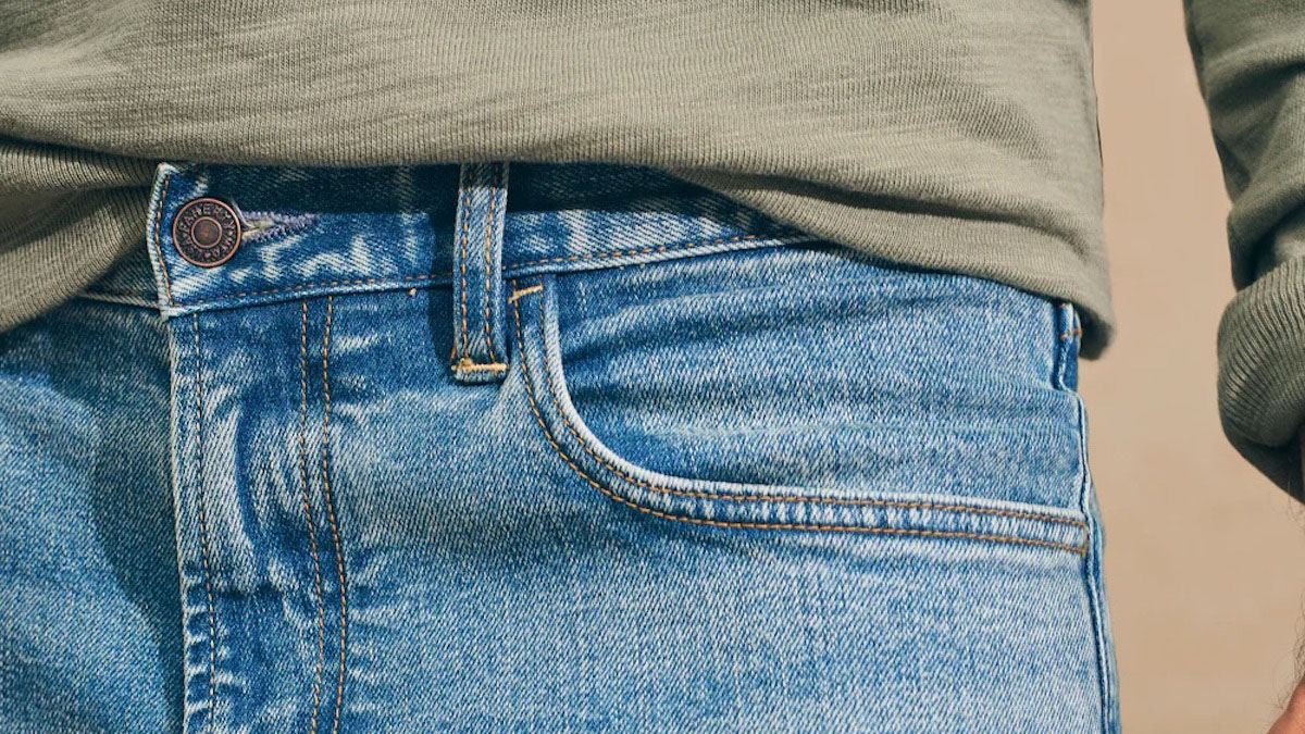 a close up of a model in Faherty's Organic Cotton Denim