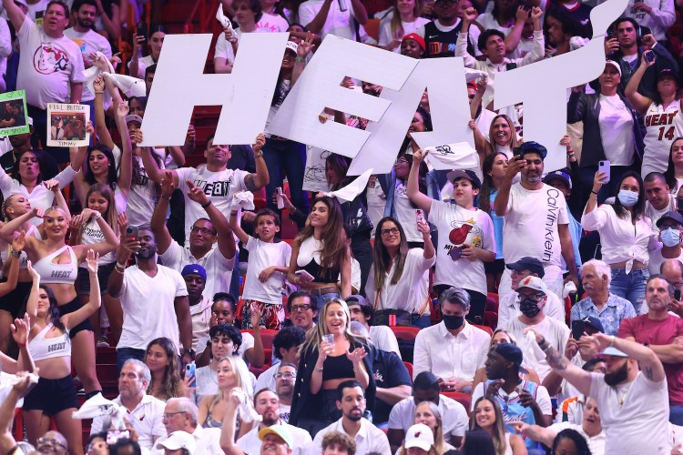 Fans cheer in Game Five of the Eastern Conference First Round between the Miami Heat and the Atlanta Hawks at FTX Arena on April 26, 2022 in Miami, Florida.