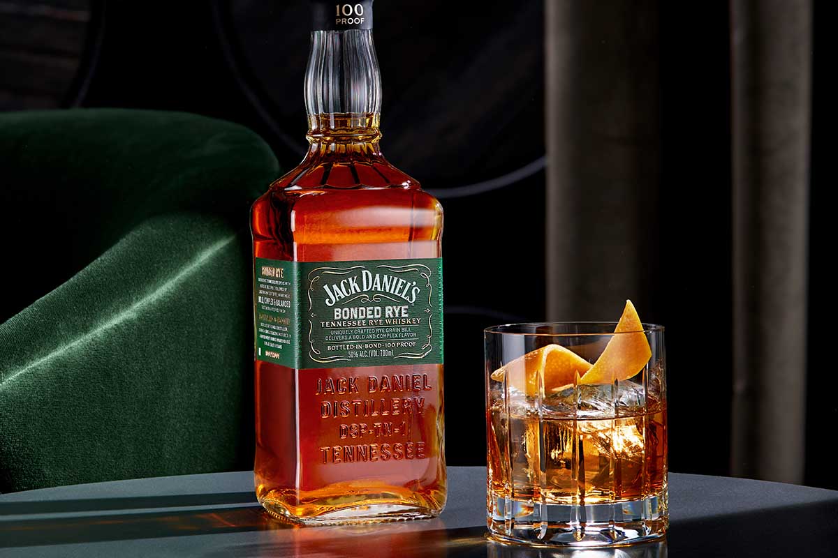 Jack Daniel's Bonded Rye, just released, with a whiskey cocktail on a table