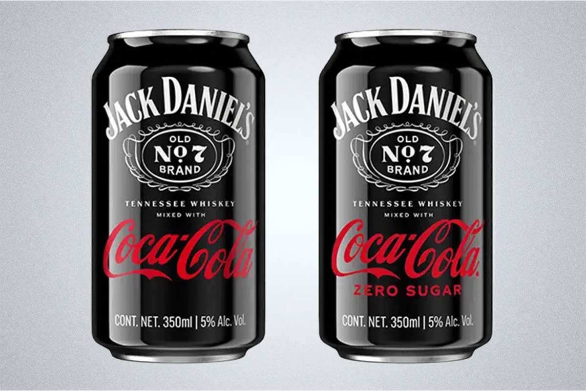Two cans of the Jack Daniel's and Coca-Cola ready-to-drink (RTD), which has been a huge success for parent company Brown-Forman