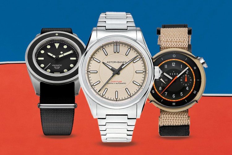 A black watch, a silver watch and a brown watch