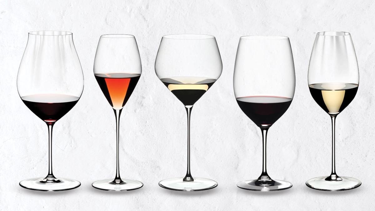riedel wine glasses on a grey background