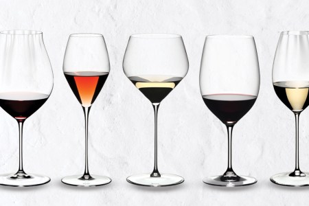 riedel wine glasses on a grey background