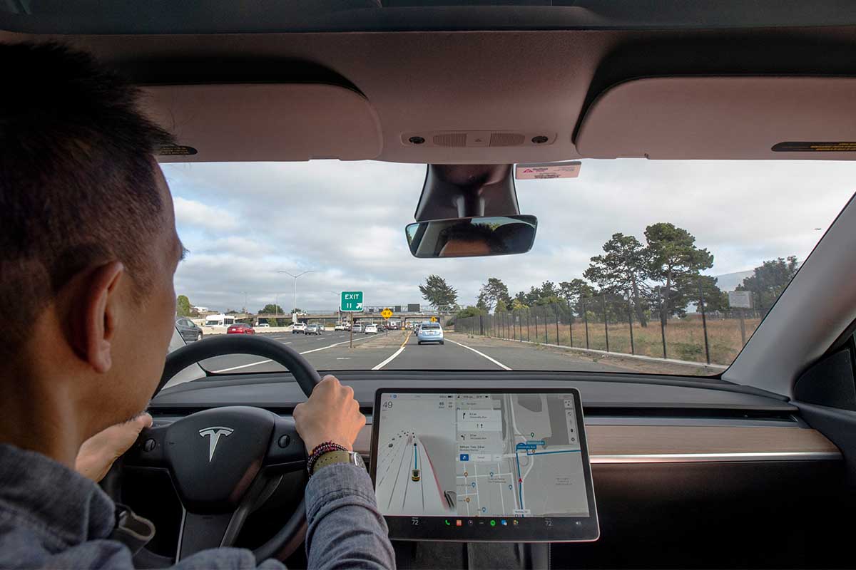 Tesla Model Y, equipped with FSD system. View of FSD system in action with Tesla dashboard display. A new Mozilla report suggests cars like Teslas are privacy nightmare.s