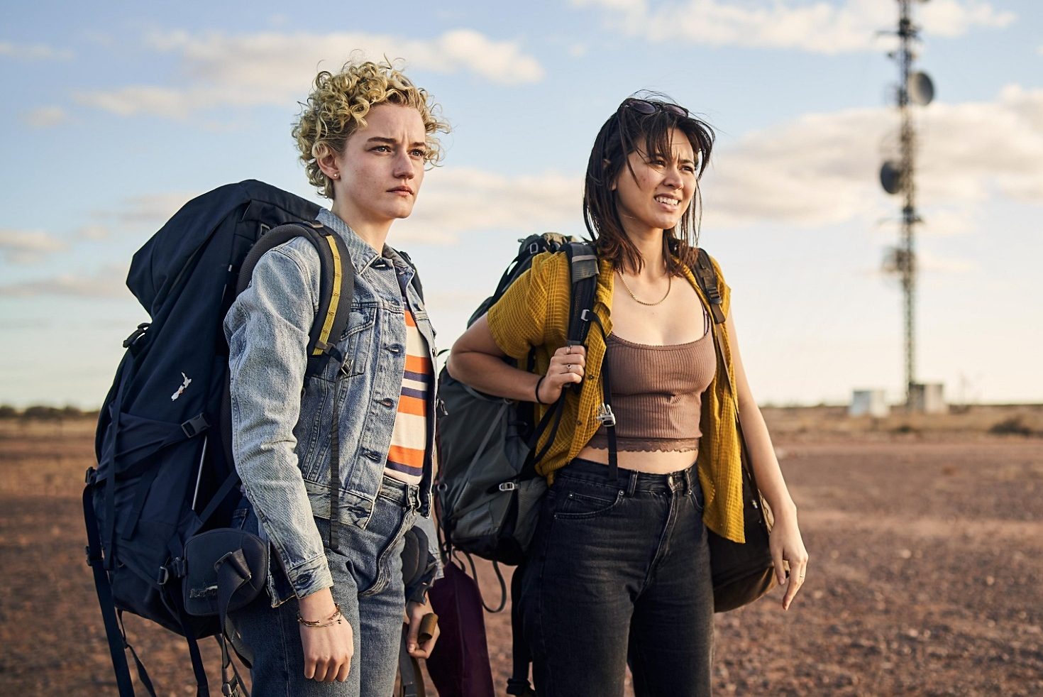 Julia Garner and Jessica Henwick in "The Royal Hotel"