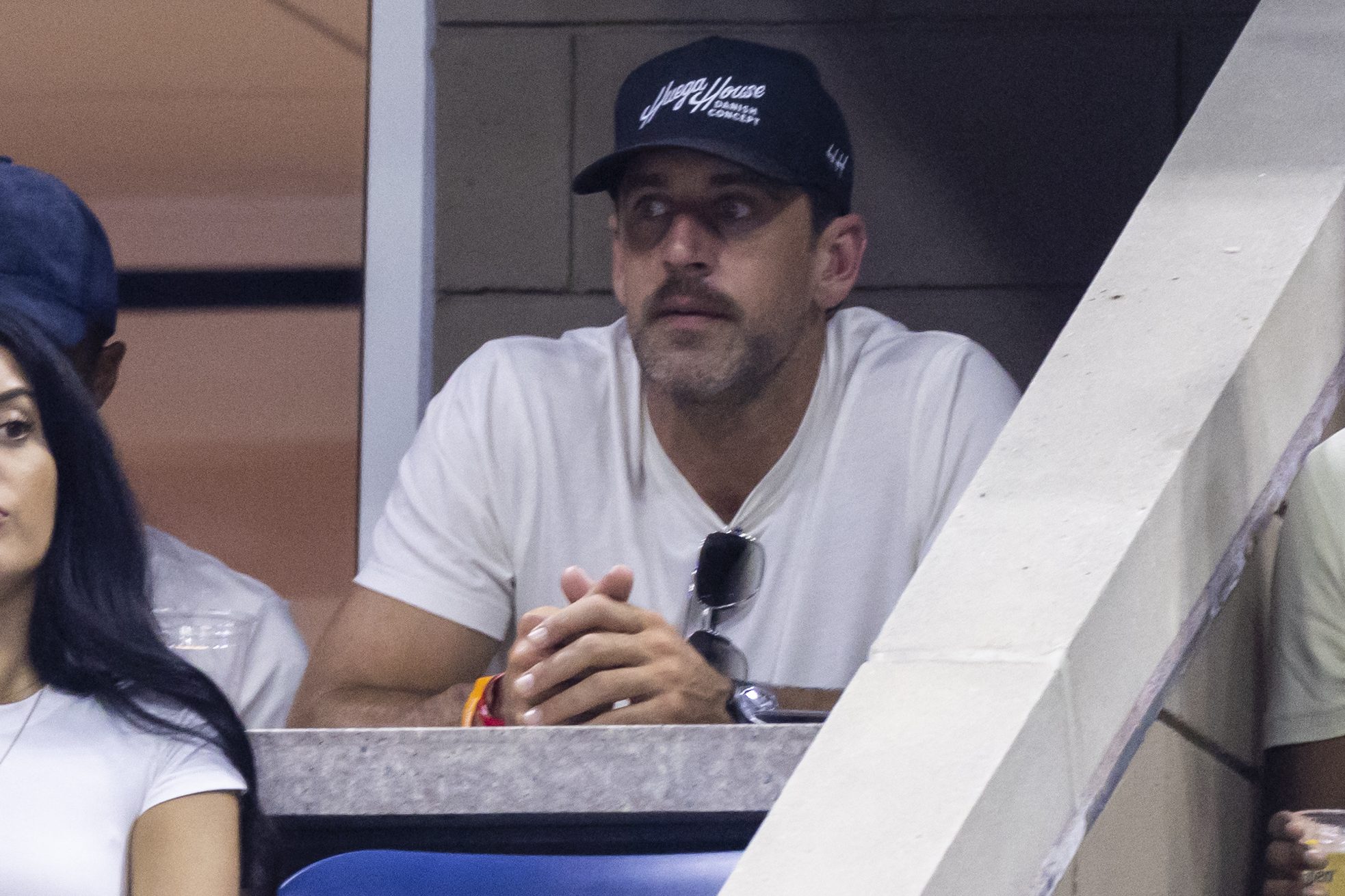 Aaron Rogers watches Novak Djokovic during the US Open.