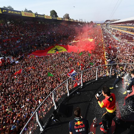 Max Verstappen, Sergio Perez and Carlos Sainz celebrate on the podium after the Italian Grand Prix at Monza.