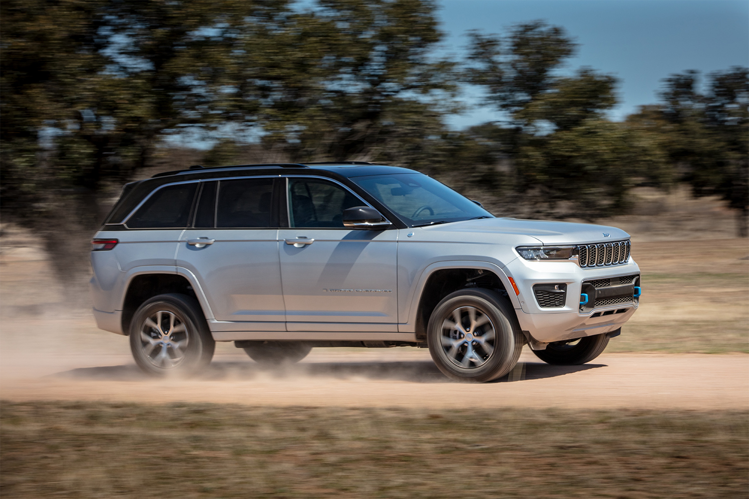 2023 Jeep Grand Cherokee 4xe Overland driving in the dirt