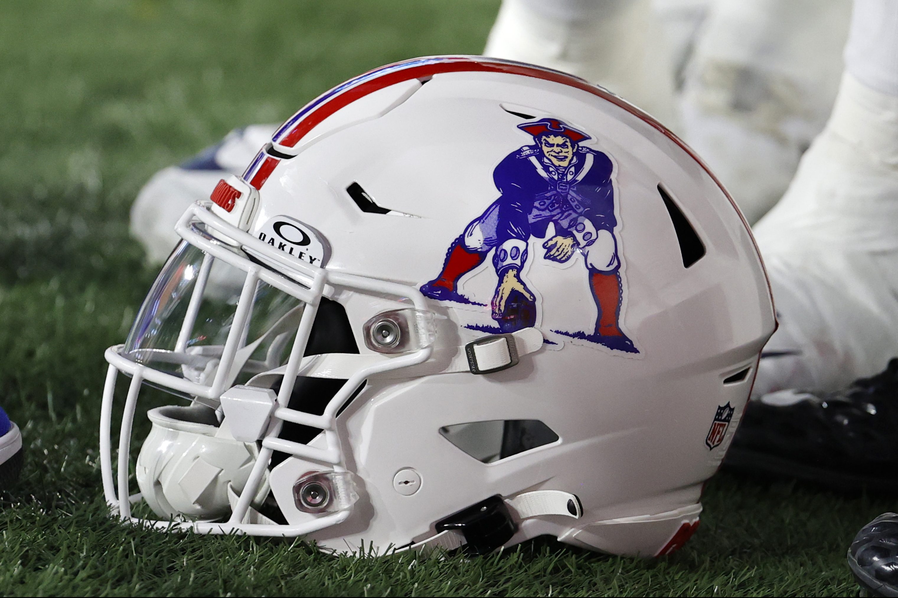 A retro Pat Patriot helmet on the field at Gillette Stadium in Massachusetts.