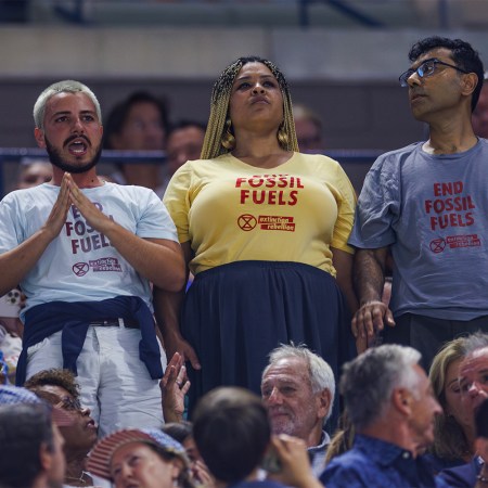 Three Extinction Rebellion protesters disrupt play at the U.S. Open.