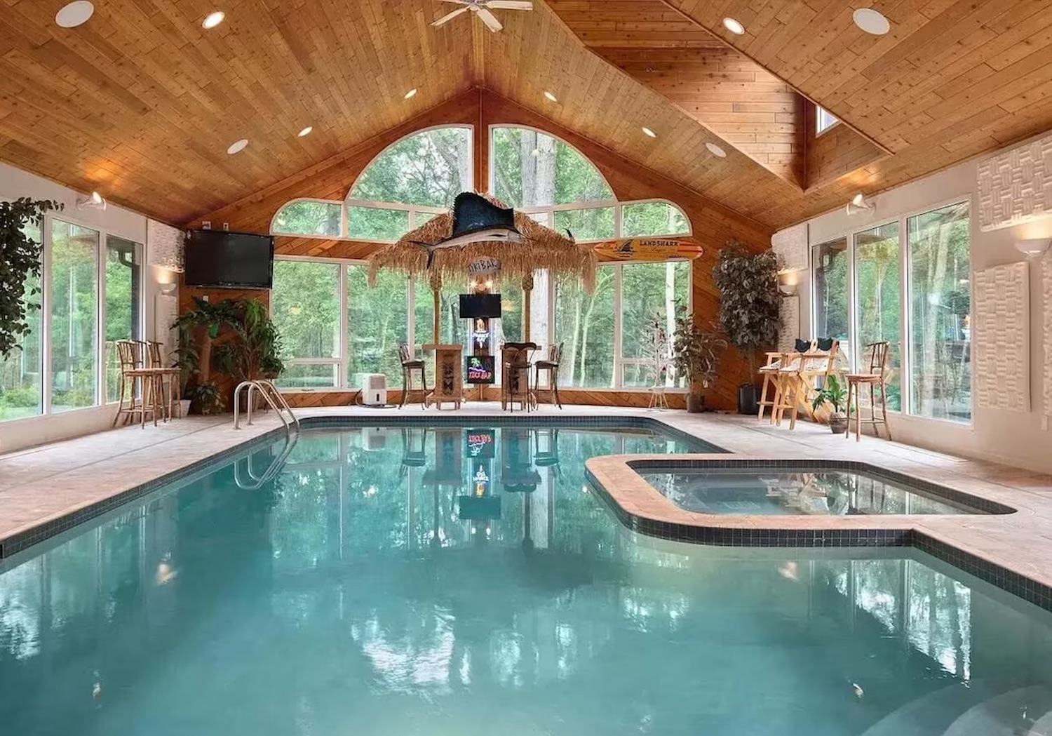 Indoor pool in a light-colored wood room 