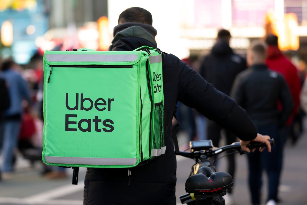 An Uber eats worker on a bicycle November 19, 2022 in Cardiff, Wales