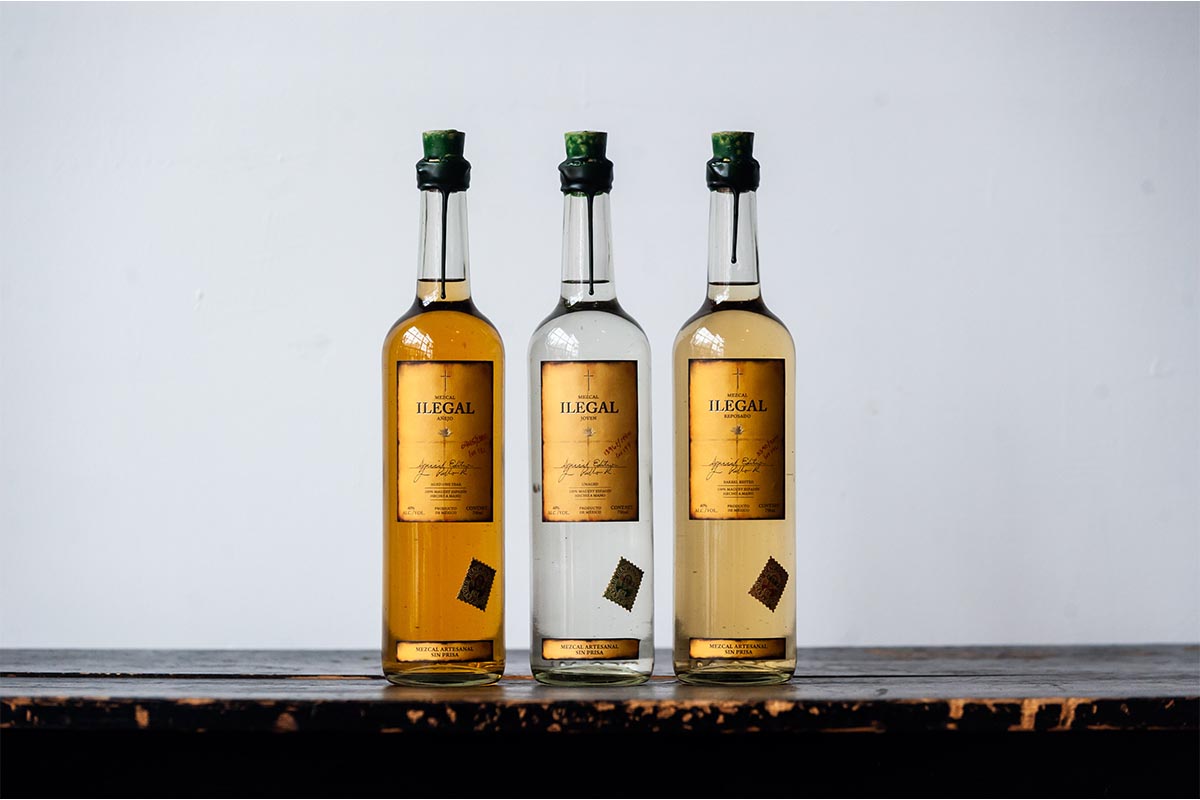 three bottles of Ilegal Mezcal, which was just acquired by Bacardi
