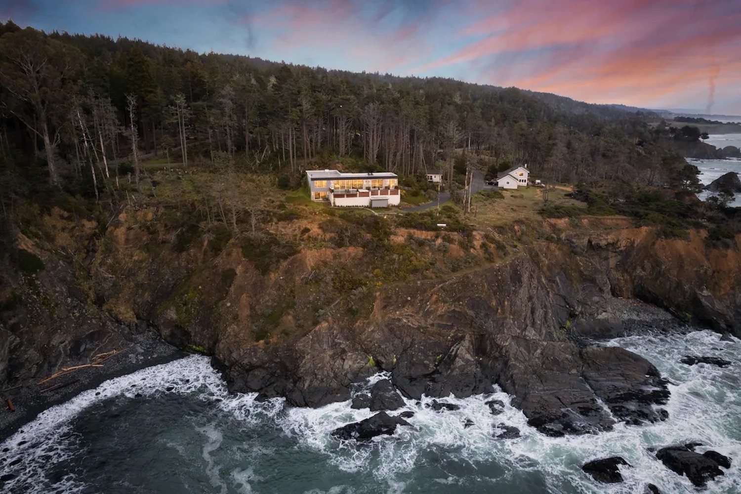 House on a cliff overlooking the coast 