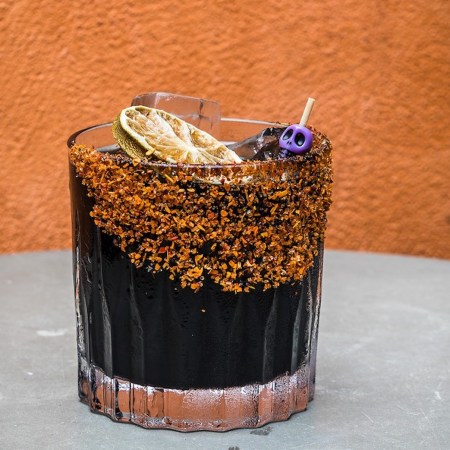 A black-colored Margarita, the perfect cocktail for a Halloween party