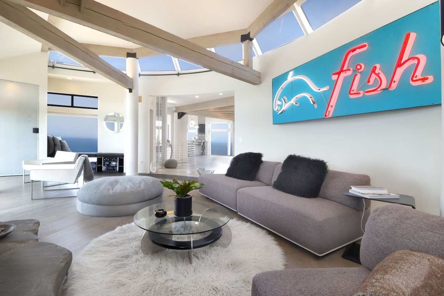 Gray and white living room with a "Fish" sign