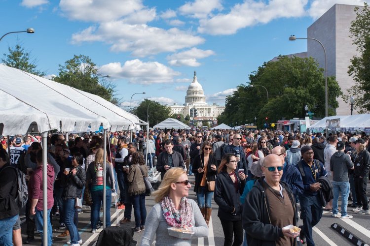 Crowd of people and tents in front of Capitol Hill for the beer festival Snallygaster