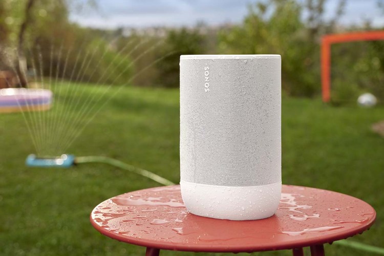 Sonos Move 2 outdoors near a sprinkler