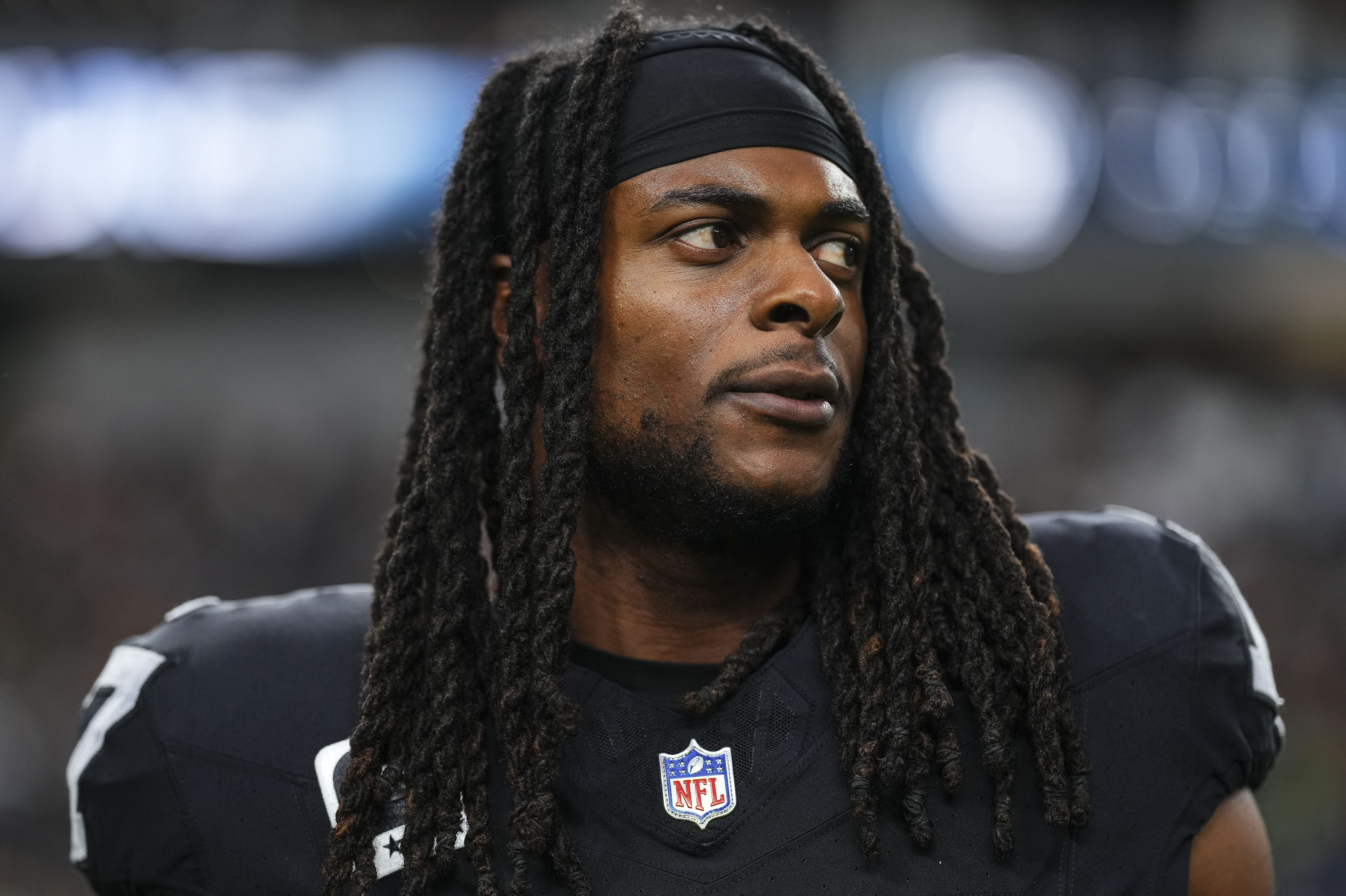 Davante Adams of the Las Vegas Raiders warms up prior to a game.