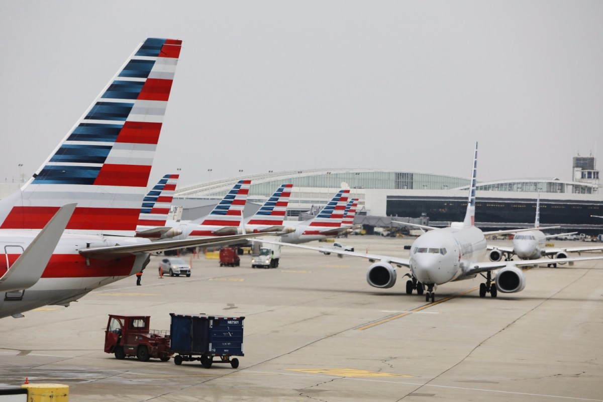 American Airlines planes at an airport. The airline is upgrading service to Las Vegas ahead of the Super Bowl in 2024.