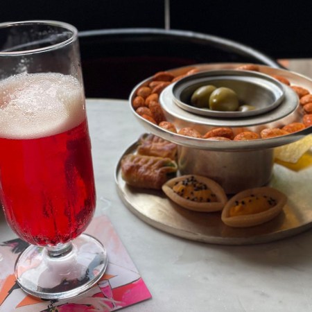 A drink and snacks at an Italian bar during aperitivo hour