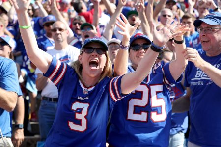 Fans react during a game between the Bills and Dolphins.