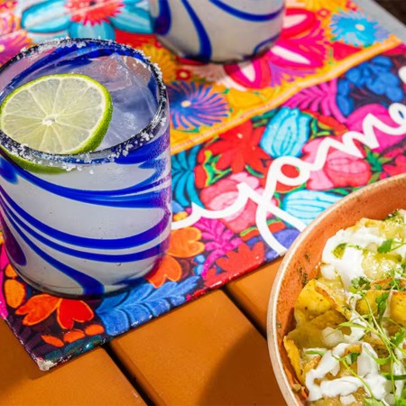 A margarita and appetizer at Oyamel, which has one of the best Michelin Guide-approved happy hours in Washington, DC