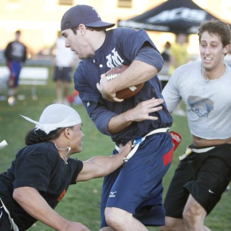 Players compete in a championship flag football game.