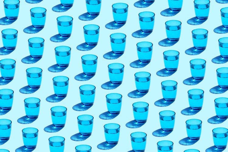 A series of water cups against a blue background.