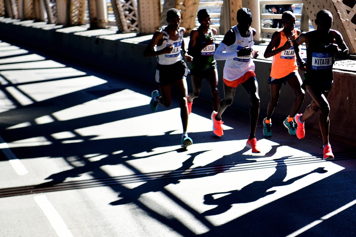 A pack of elite runners at the front of the New York Marathon. Want to run faster? Try using heart rate zones.