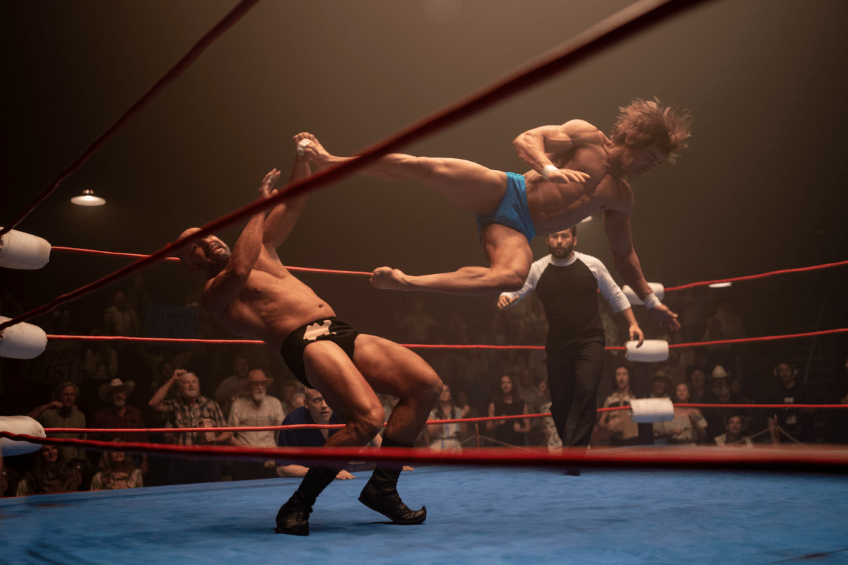 Two men fighting in a boxing ring