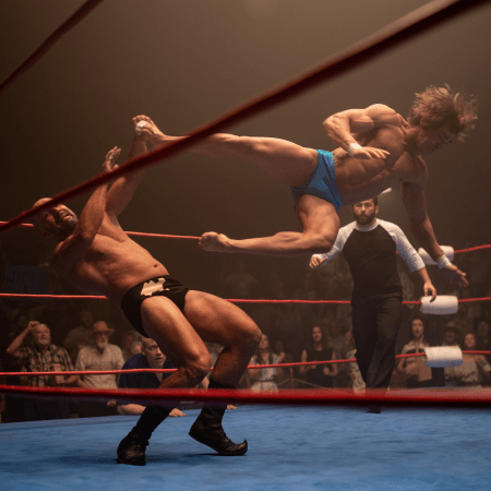 Two men fighting in a boxing ring