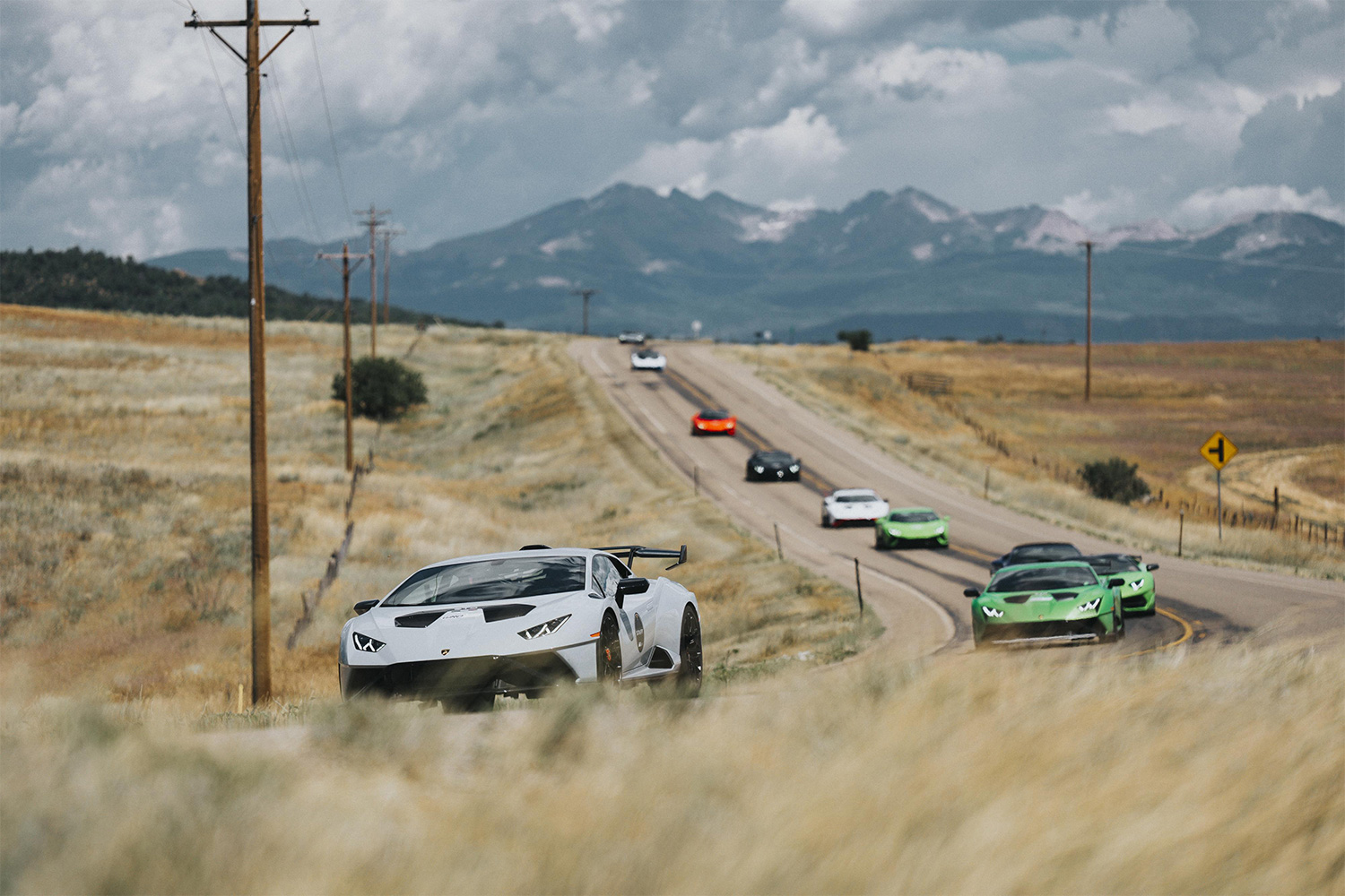 A group of Lamborghini drivers on rural roads in Colorado near Aspen
