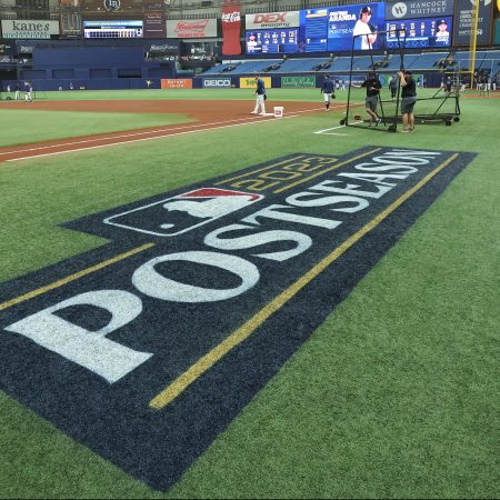 MLB's postseason logo on the field before a Wild Card series.
