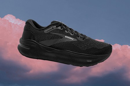 a pair of black brooks ghost max on a cloud background