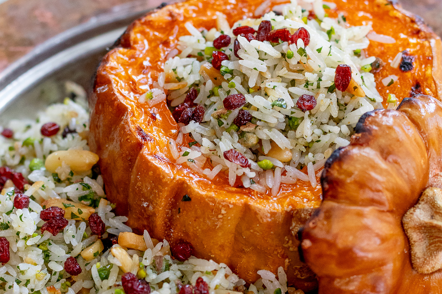 Pumpkin bowl filled with rice pilaf inside