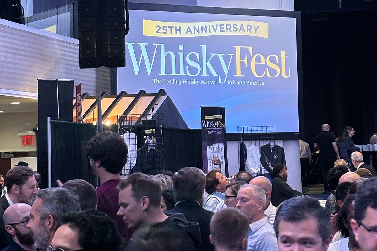 The banner and crowd from WhiskyFest 2023, held in November in NYC