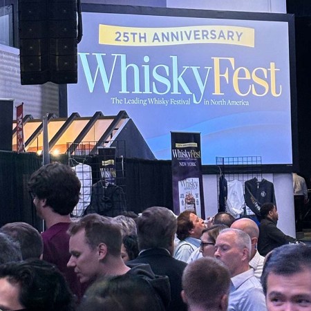 The banner and crowd from WhiskyFest 2023, held in November in NYC