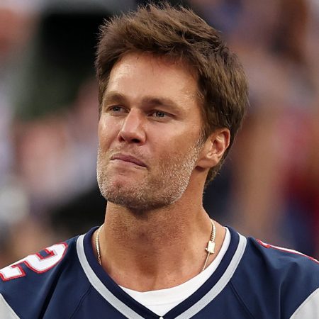 Tom Brady speaks during a return to New England.