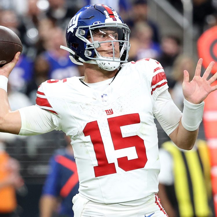 Tommy DeVito of the Giants throws a pass.